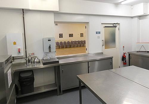 The kitchen has a hatch opening to the Main Hall Photo Gallery Image - The kitchen has a hatch opening to the Main Hall